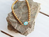 “Evil eye” golden hematite bracelet